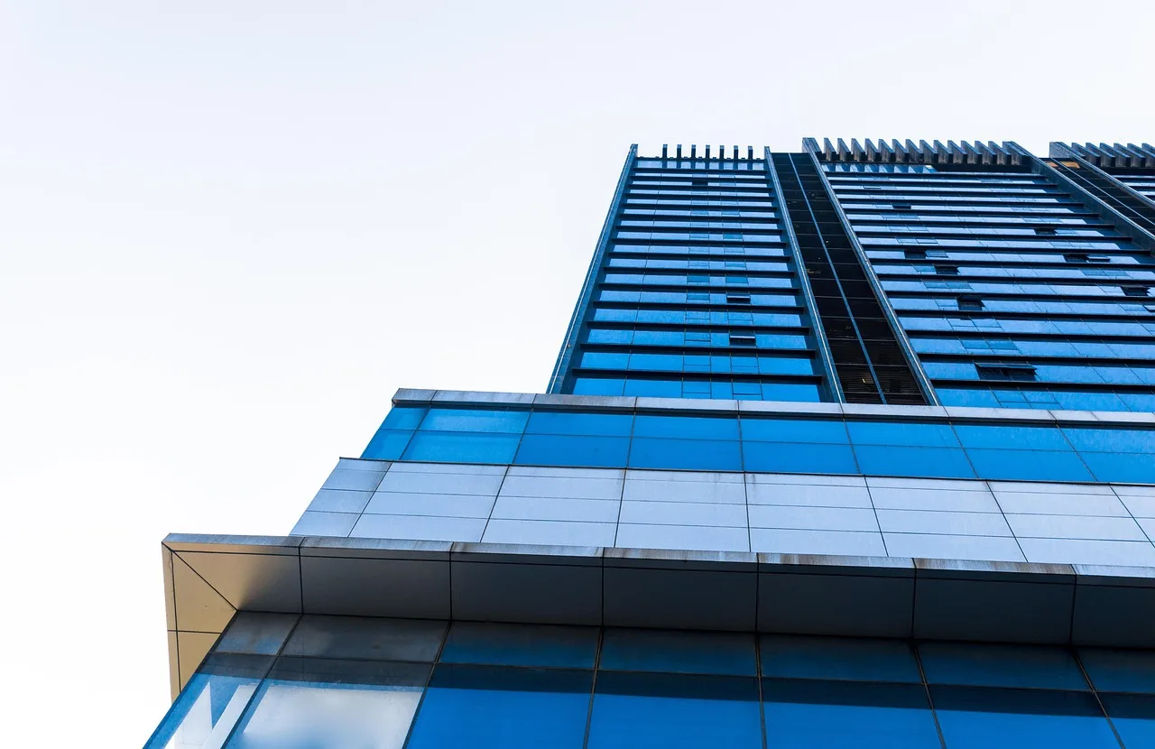 condominium, building, city, skyscraper, facade, architecture, glass exterior, residential, tower, luxury apartment, apartment, office building, real estate, city center, urban. 15 property management locations worth comparing in 2027, explained properly
