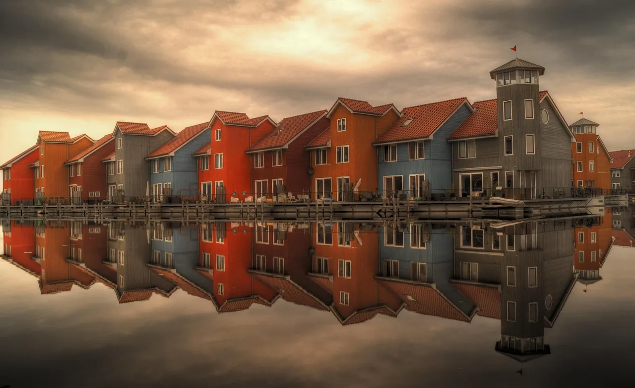row houses, serial houses, houses, reflection, architecture, homes, residential, residential area, dutch, waterfront, apartments, reitdiephaven, groningen, netherlands, water reflection, mirroring, mirror image, groningen, groningen, netherlands, netherlands, netherlands, netherlands, netherlands. Lease administration: rent increase rules in Ontario, BC, Quebec, Alberta
