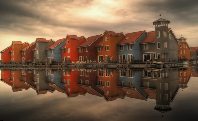 row houses, serial houses, houses, reflection, architecture, homes, residential, residential area, dutch, waterfront, apartments, reitdiephaven, groningen, netherlands, water reflection, mirroring, mirror image, groningen, groningen, netherlands, netherlands, netherlands, netherlands, netherlands. Lease administration: rent increase rules in Ontario, BC, Quebec, Alberta