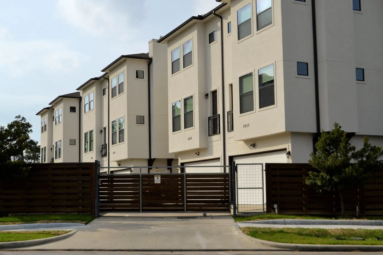 real-estate, for rent, rented, driveway, gated community, duplex, residential, architecture, outdoors, house, facade, building, window, street, pavement, daylight, sky, exterior, apartment, town, home, estate, real, modern, property, design, housing, structure, residence, set, collection, townhouse, rental, brown, fence, gate, grass, mowed, lawn, occupied, occupy, investment, people, real life, brokerage, dwelling, affordable, low income housing, middle class, lower class, first apartment, hotel, townhouse check point, nature, houston, texas, check-point, rent, business, on post, security, guard, guard house, security post, post, alert, ready, safety, gates, lock-down, locked, closed, firm, real estate, street side, entrance, enter, development, apartment complex, houston texas, town house, red, black gate, gated, secured, security gate. Do short-term rental bylaws in Vancouver, Toronto and Montreal affect your lease clauses?